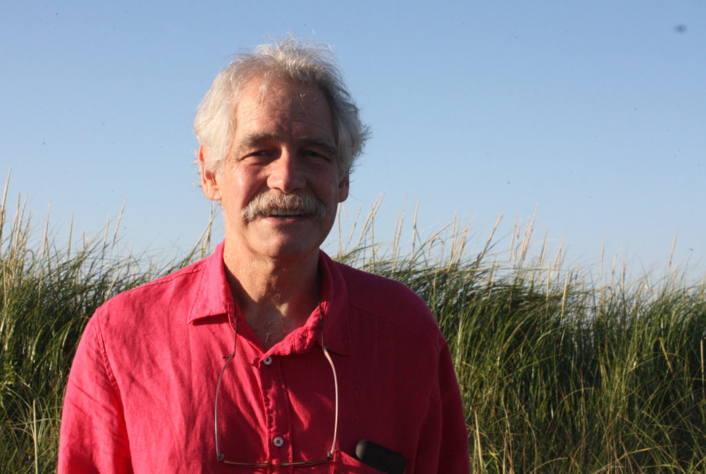 Picture of Gordon Starr in front of phragmites